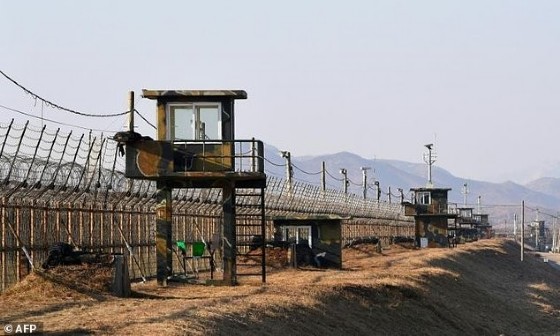 South Korean guard posts along a heavily fortified border fence marking the Demilitarized Zone dividing the two Koreas