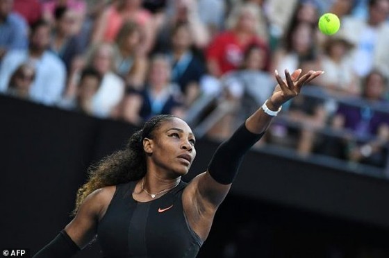 Serena Williams of the US serves against Venus Williams of the US during the women's singles final on day 13 of the Australian Open tennis tournament in Melbourne on January 28, 2017