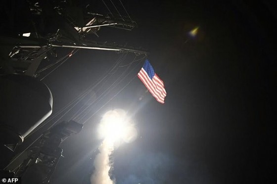 In this image released by the US Navy, the guided-missile destroyer USS Porter launches missiles at a Syrian airbase from the Mediterranean on April 7, 2017, in retaliation for an alleged chemical attack on a rebel-held town