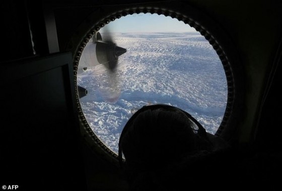 A glacier is seen from NASA's Operation IceBridge research aircraft above Greenland, studying how polar ice has evolved over the past nine years