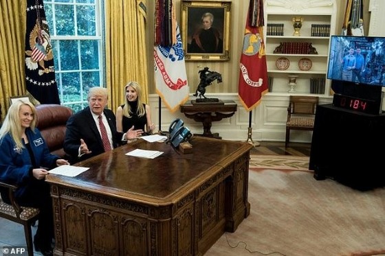 Flanked by NASA Astronaut Kathleen Rubins and his daughter Ivanka, Trump asked Peggy Whitson aboard the ISS about NASA's plans for Mars missions