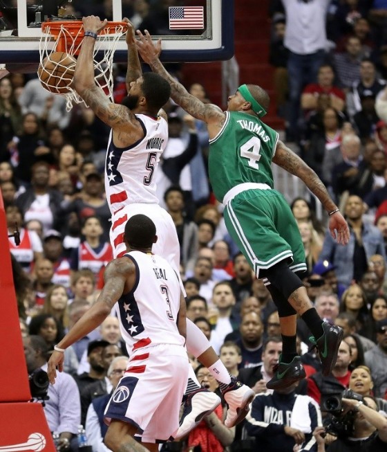 Markieff Morris of the Washington Wizards dunks against Isaiah Thomas of the Boston Celtics during Game Six of the Eastern Conference Semifinals