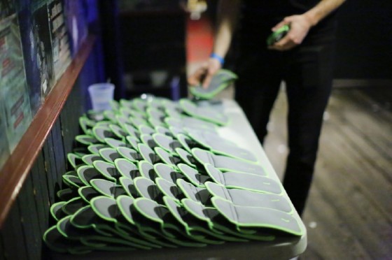A man arranges secure phone bags before a Lights Out concert at The Knitting Factory in Brooklyn New York on May 12, 2017