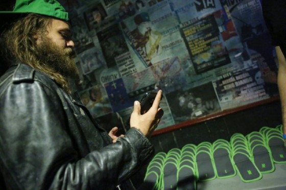 A member of the audience checks his phone before it is placed in a secure bag before attending a Lights Out concert at The Knitting Factory in Brooklyn New York on May 12, 2017