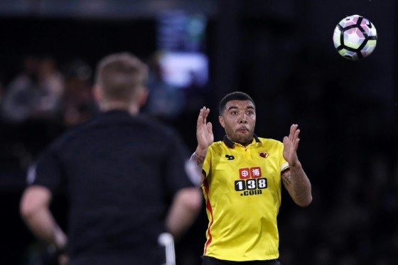 Watford's top scorer Troy Deeney heads the ball during their English Premier League match against Liverpool, at Vicarage Road Stadium in Watford, on May 1, 2017