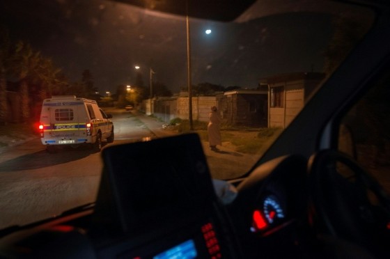 Ambulances working in gang-ridden parts of town stay close to their police escorts in areas designated as unsafe for ambulance crews -- but sometimes the gangs target the police for their weapons