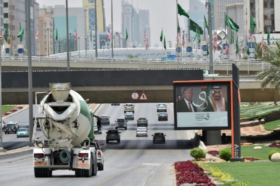 A giant billboard bearing portraits of US President Donald Trump and Saudi Arabia's King Salman, is seen on a main road in Riyadh