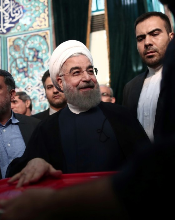 Iranian President Hassan Rouhani, who initial results suggest has comfortably won re-election, casts his vote in Tehran on May 19, 2017