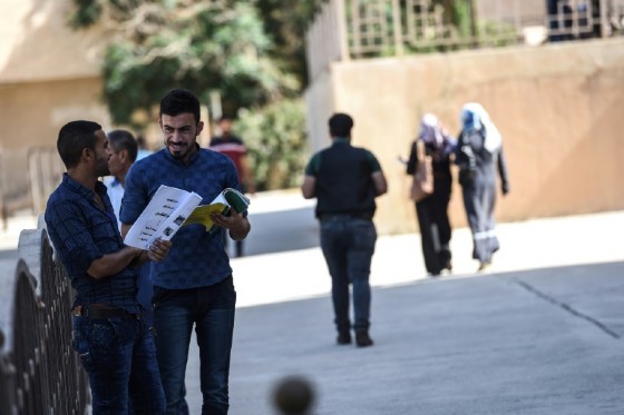 Iraqi students chat at the University of Mosul