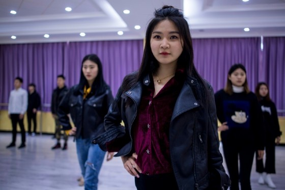 Wang Xin, 20, switched from accounting to a major in wanghong -- social media stardom.
"I have always had an idea, a dream to be on stage with the lights on me and the crowd watching me," she told AFP.
