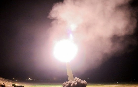 A picture provided by the Iran's state TV official website shows Iranian Revolutionary Guards launching a missile from an undisclosed location in western Iran, towards Islamic State bases in Syria
