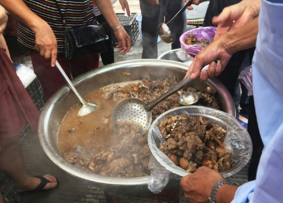 Dog meat is served at a restaurant in Yulin