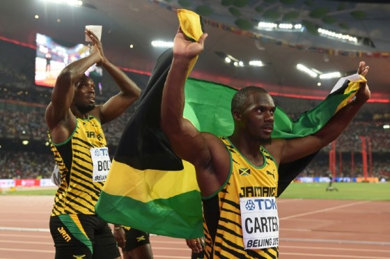 Jamaica's Usain Bolt (left) and Nesta Carter celebrate victory in the 4x100 metres relay at the 2015 World Championships in Beijing