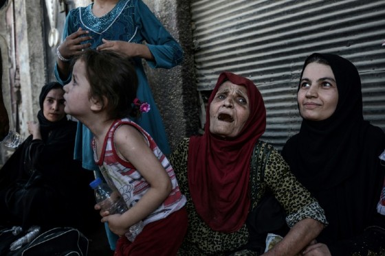 Iraqis fleeing the Old City of Mosul are seen on June 23, 2017