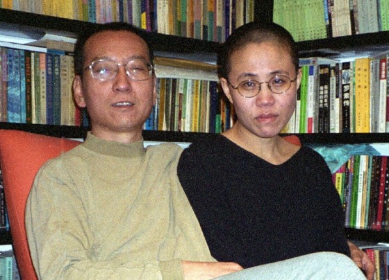 File photo released by the Liu's family and taken on October 22, 2002 shows Chinese dissident and Nobel Peace laureate Liu Xiaobo and his wife Liu Xia in Beijing