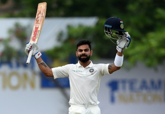 India captain Virat Kohli celebrates reaching his century during the fourth day of the first Test against Sri Lanka in Galle on July 29, 2017