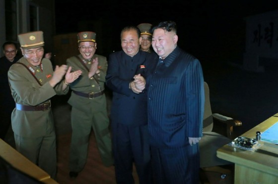 North Korean leader Kim Jong-Un is shown celebrating a test launch of an intercontinental ballistic missile (ICBM), Hwasong-14 in this state media photo