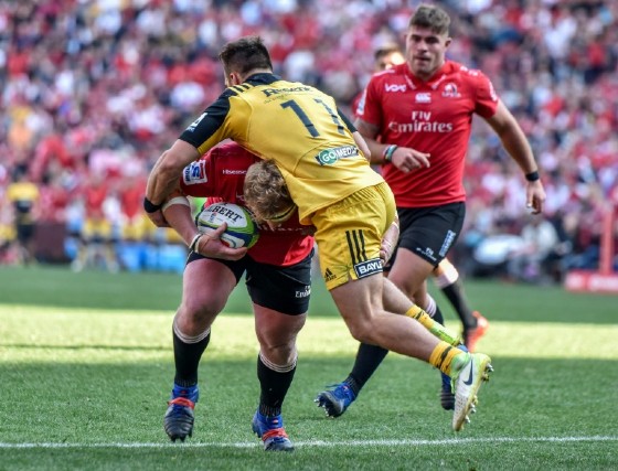 Jacques van Rooyen (L) of the Lions clashes with Wes Goosen of the Hurricanes during the Super Rugby semi-final match in Johannesburg