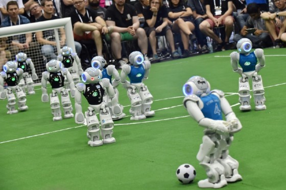The robots "see" using a camera installed in their heads, while installed with artificial intelligence (AI) to recognise the spacing and objects in the sight
