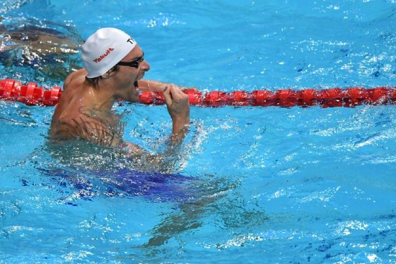 France's Camille Lacourt reacts after winning the final of the men's 50m backstroke on July 30, 2017