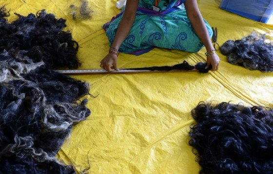 For Hindu followers in India head shaving is an act of devotion, but temple attendants collect the locks for sale to be used for wigs or hair extensions