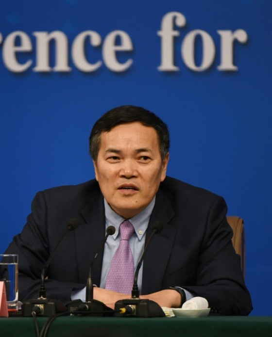 Chinese Vice Minister of Commerce Qian Keming speaks during a National People's Congress press conference in Beijing, in March 2017