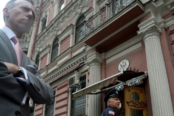 Security officers stand guard outside the US consulate in the Russian city of Saint Petersburg on July 31, 2017