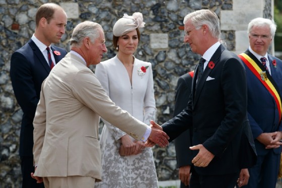 (From left) Britain's Prince Charles and King Philippe of Belgium shake hands as Britain's Princess Kate and Prince William look on during the commemorations at The Tyne Cot Commonwealth War Graves Cemetery in Zonnebeke on July 31, 2017