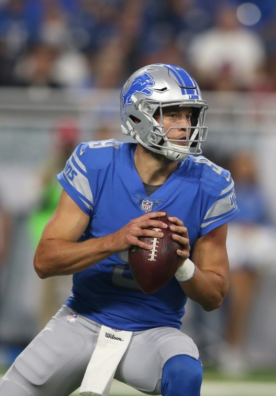 Quarterback Matthew Stafford of the Detroit Lions drops back to pass against the Arizona Cardinals, at Ford Field in Detroit, Michigan, on September 10, 2017