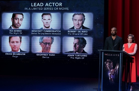 Actors Shemar Moore (L) and Anna Chlumsky present Emmy nominees for Lead Actor In a Limited Series or Movie on July 13, 2017, in Los Angeles.