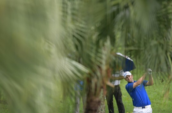 Team Europe's Bernd Wiesberger plays a shot in the fourball match against Team Asia's Li Haotong and Nicholas Fung