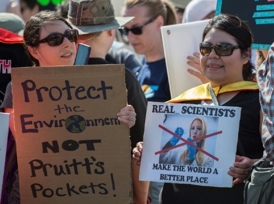 Demonstrators take part in the March for Science in Washington, DC on April 14, 2018; local scientists and supporters joined a global March for Science to fight back against what many see as an "assault on facts" by populist politicians