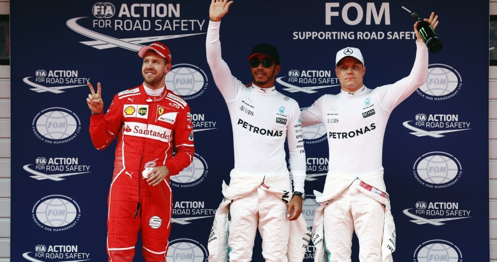 Il podio delle qualifiche in Cina: Lewis Hamilton, Sebastian Vettel e Valtteri Bottas