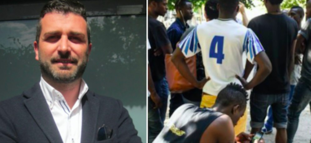 Il sindaco di Inzago (MI) Andrea Fumagalli e accanto un gruppo di immigrati