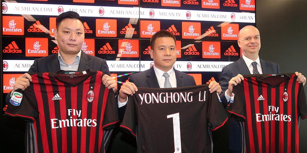 Yonghong Li con Han Li e Marco Fassone