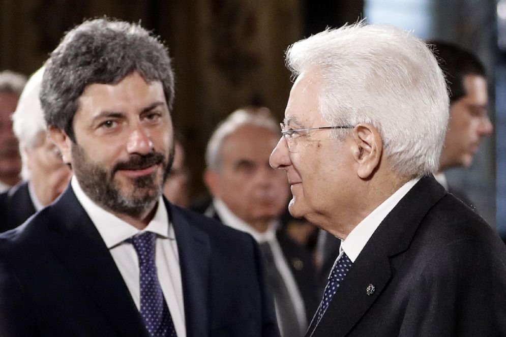 Il presidente della Repubblica Sergio Mattarella con il presidente della Camera Roberto Fico e durante la cerimonia al Quirinale per la Festa del lavoro