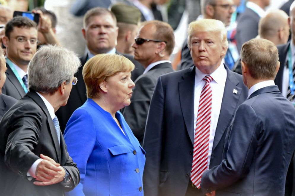 Donald Trump e Angela Merkel durante il G7 di Taormina