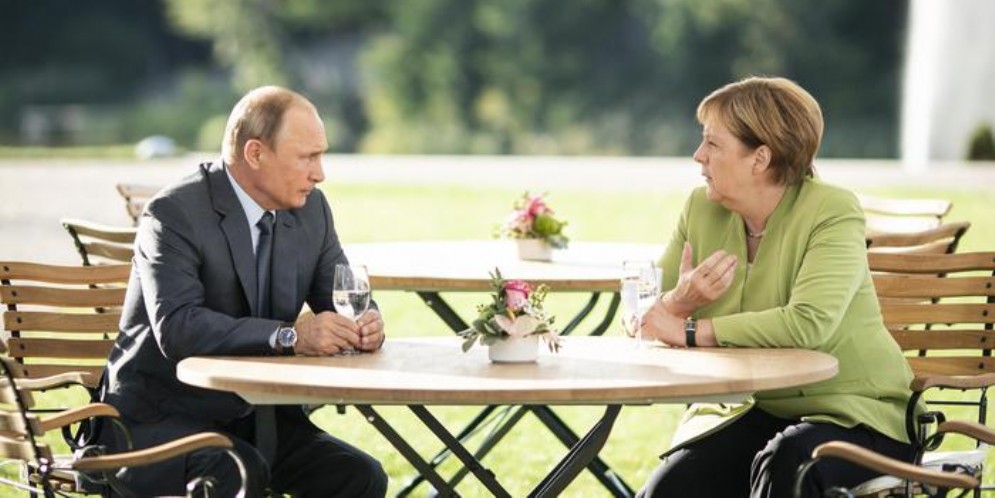 Il Presidente russo, Vladimir Putin con la Cancelliera tedesca, Angela Merkel